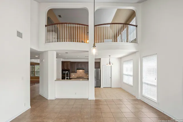 a view of a living room with a balcony