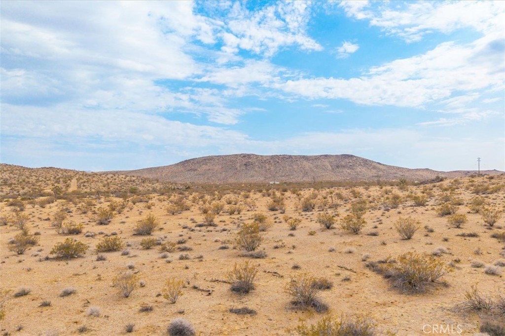 60150 Sharp Terrace Drive Landers, CA 92285 - Photo 14 of 25 a view of a large body of water and mountains