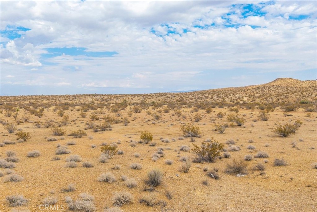 60150 Sharp Terrace Drive Landers, CA 92285 - Photo 24 of 25 a view of yard with ocean view