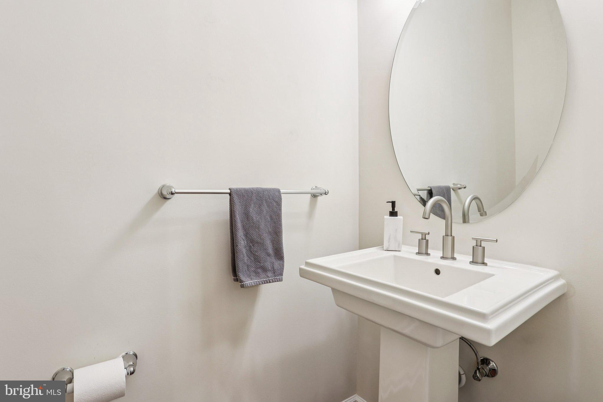 106 A Jay Alley Springfield, PA 19064 - Photo 14 of 44 Sleek modern bathroom with elegant fixtures.