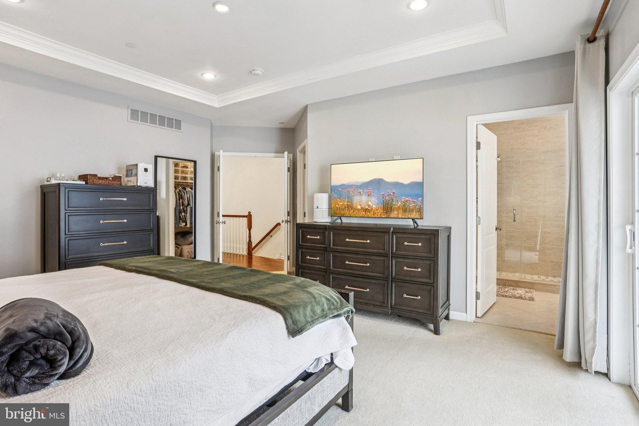 106 A Jay Alley Springfield, PA 19064 - Photo 17 of 44 a bedroom with a bed and a dresser