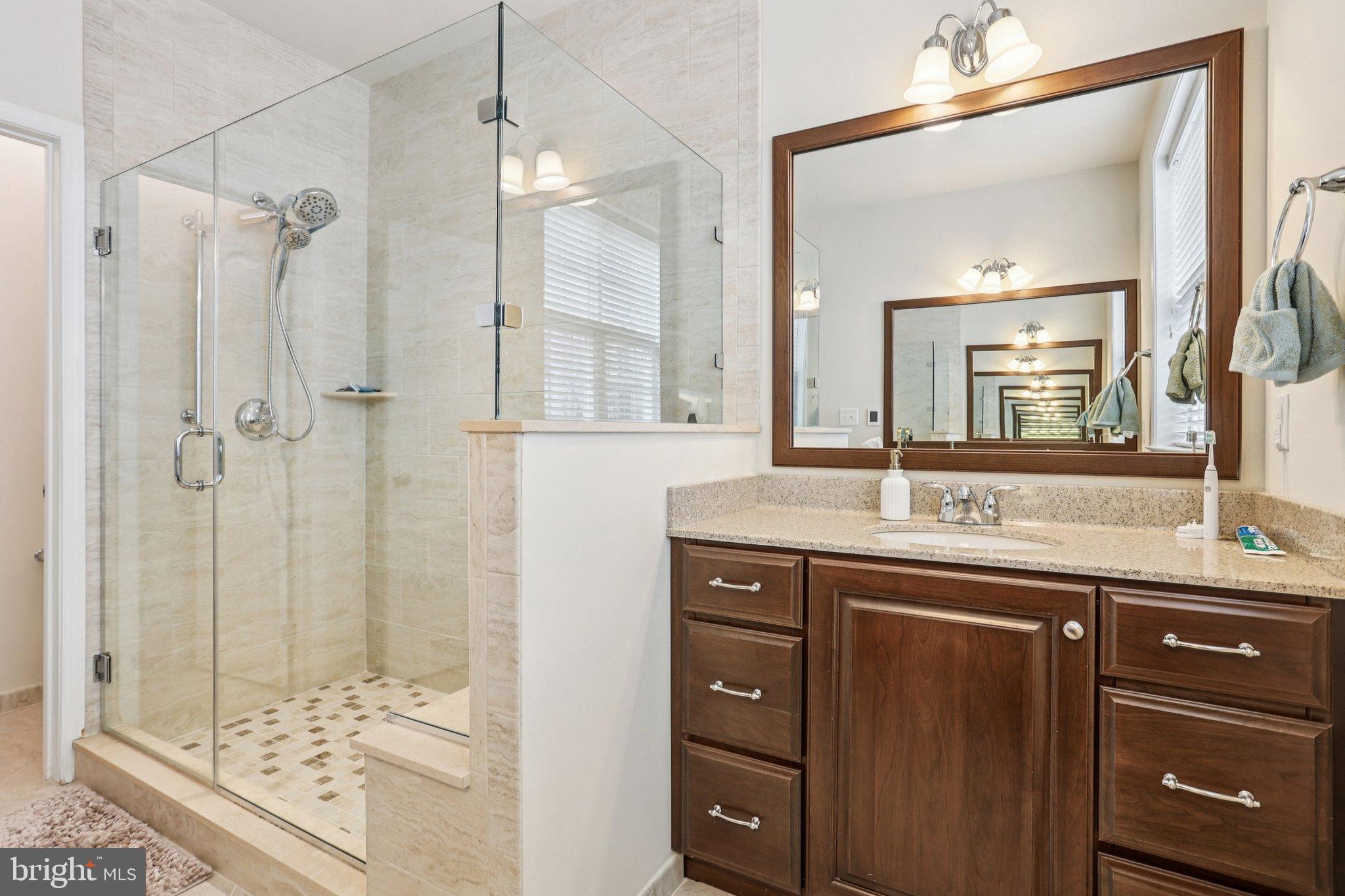106 A Jay Alley Springfield, PA 19064 - Photo 21 of 44 a bathroom with a sink and a mirror