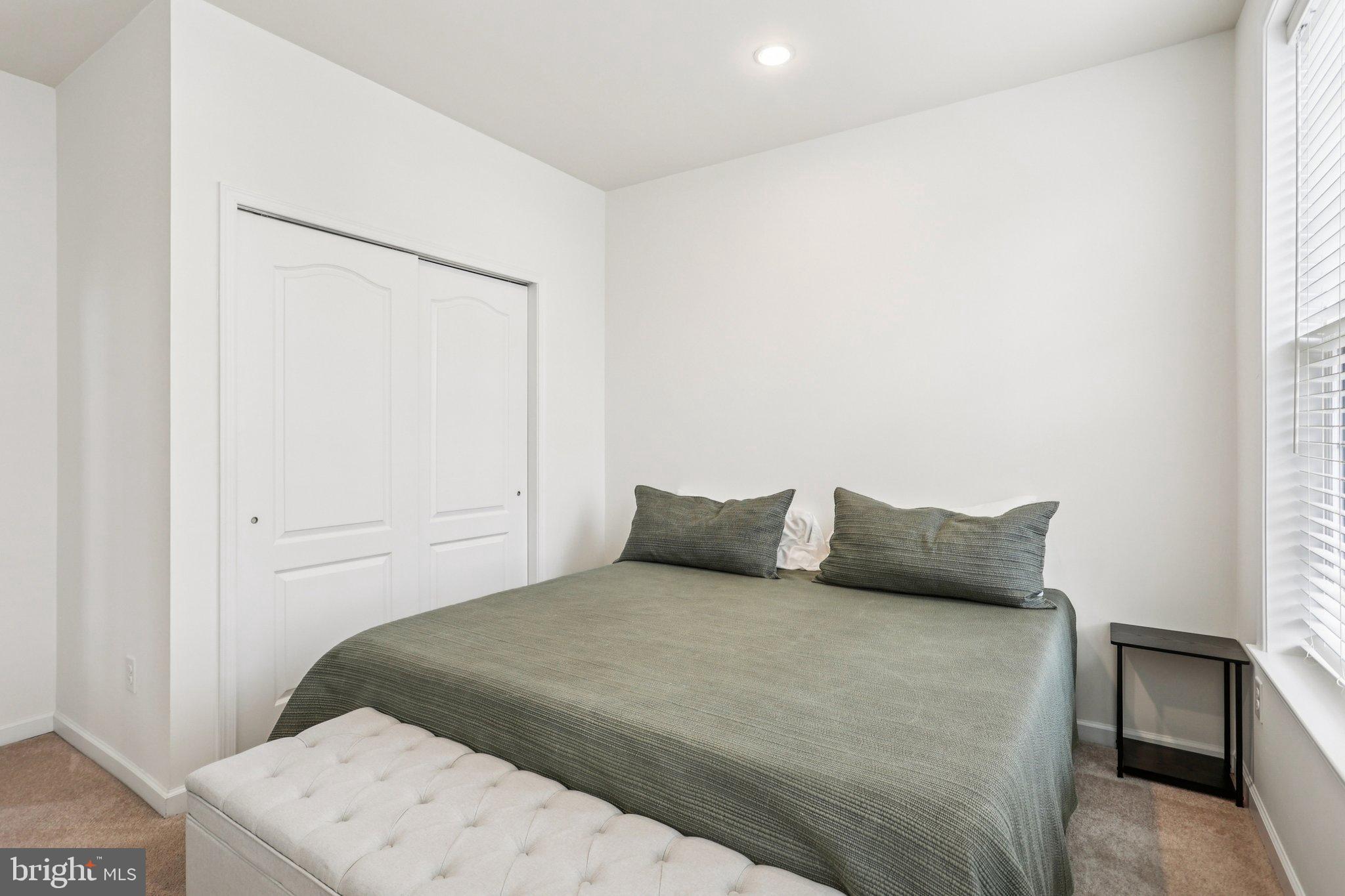 106 A Jay Alley Springfield, PA 19064 - Photo 25 of 44 a bedroom with a bed and a window