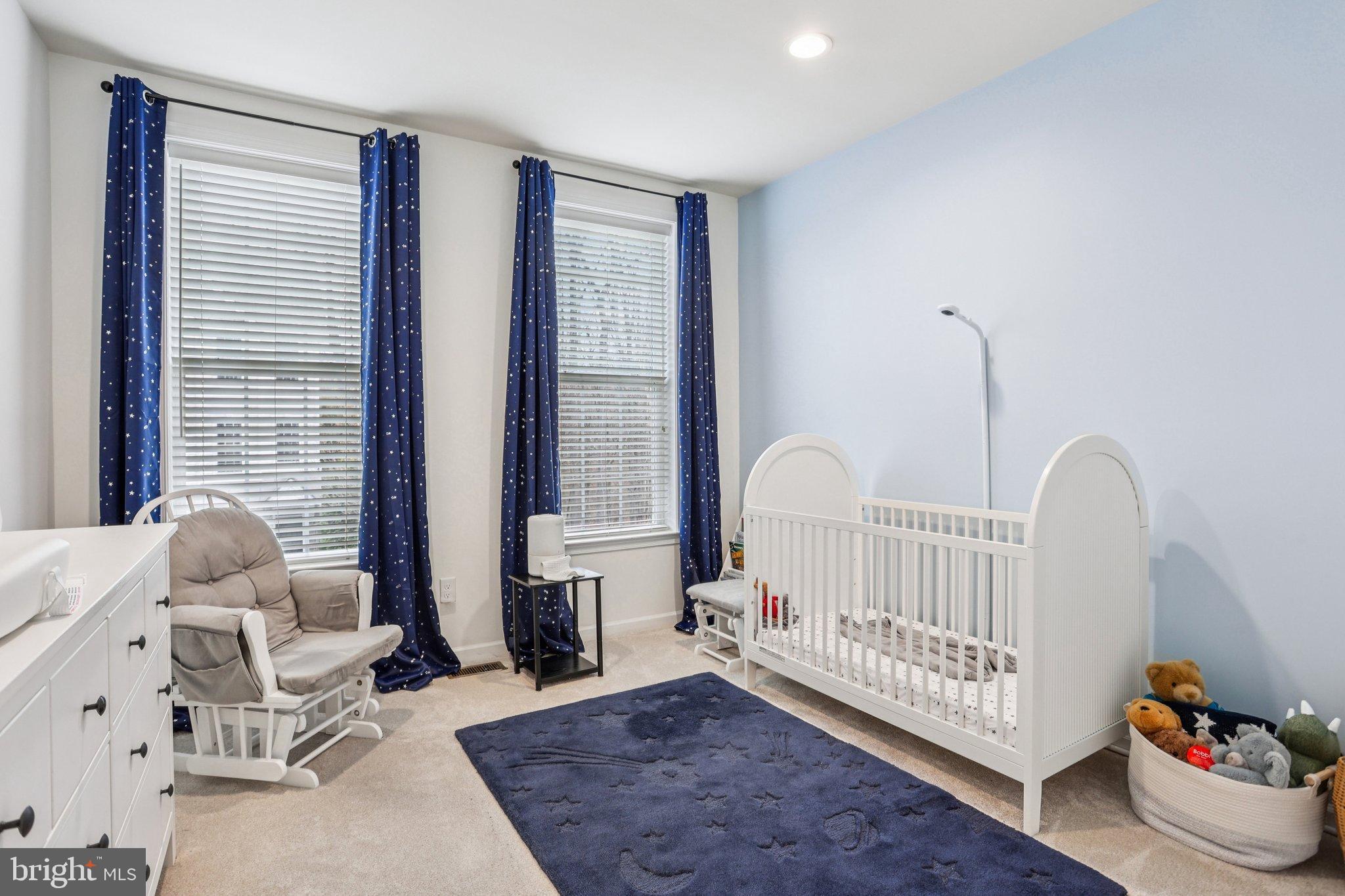 106 A Jay Alley Springfield, PA 19064 - Photo 28 of 44 a view of an empty room with furniture and a window
