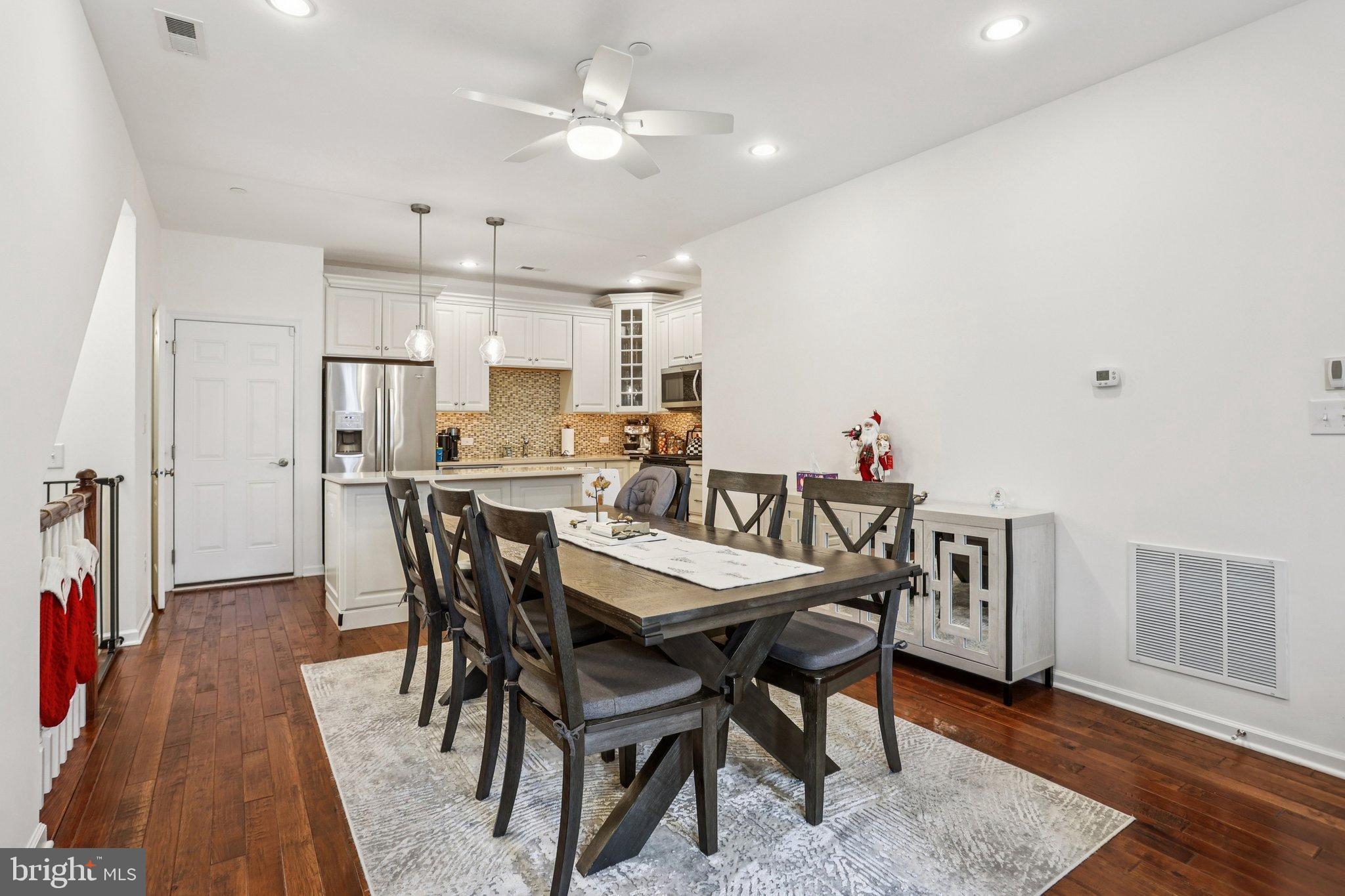 106 A Jay Alley Springfield, PA 19064 - Photo 3 of 44 a view of a dining room with furniture and wooden floor
