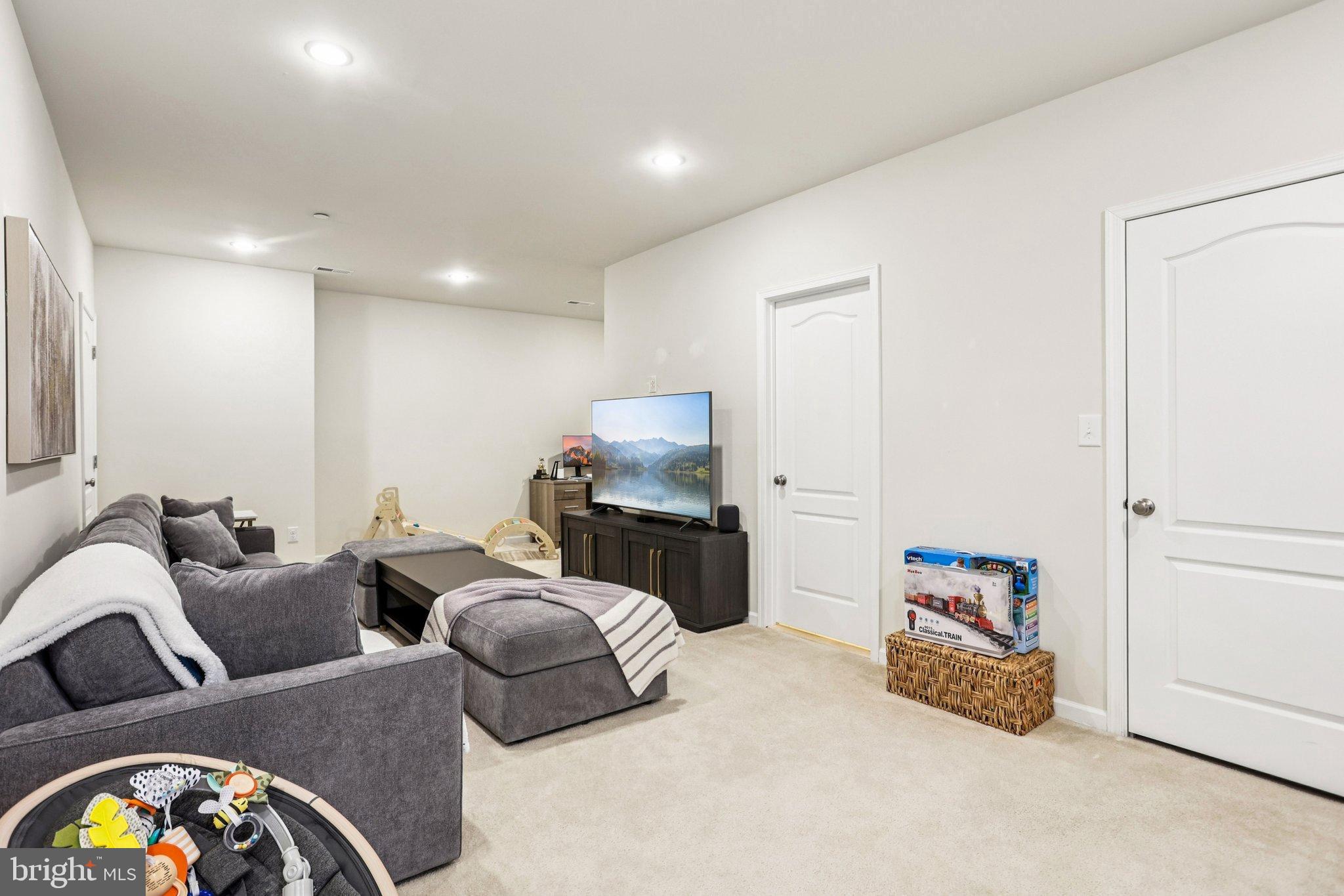 106 A Jay Alley Springfield, PA 19064 - Photo 31 of 44 a living room with furniture and a window
