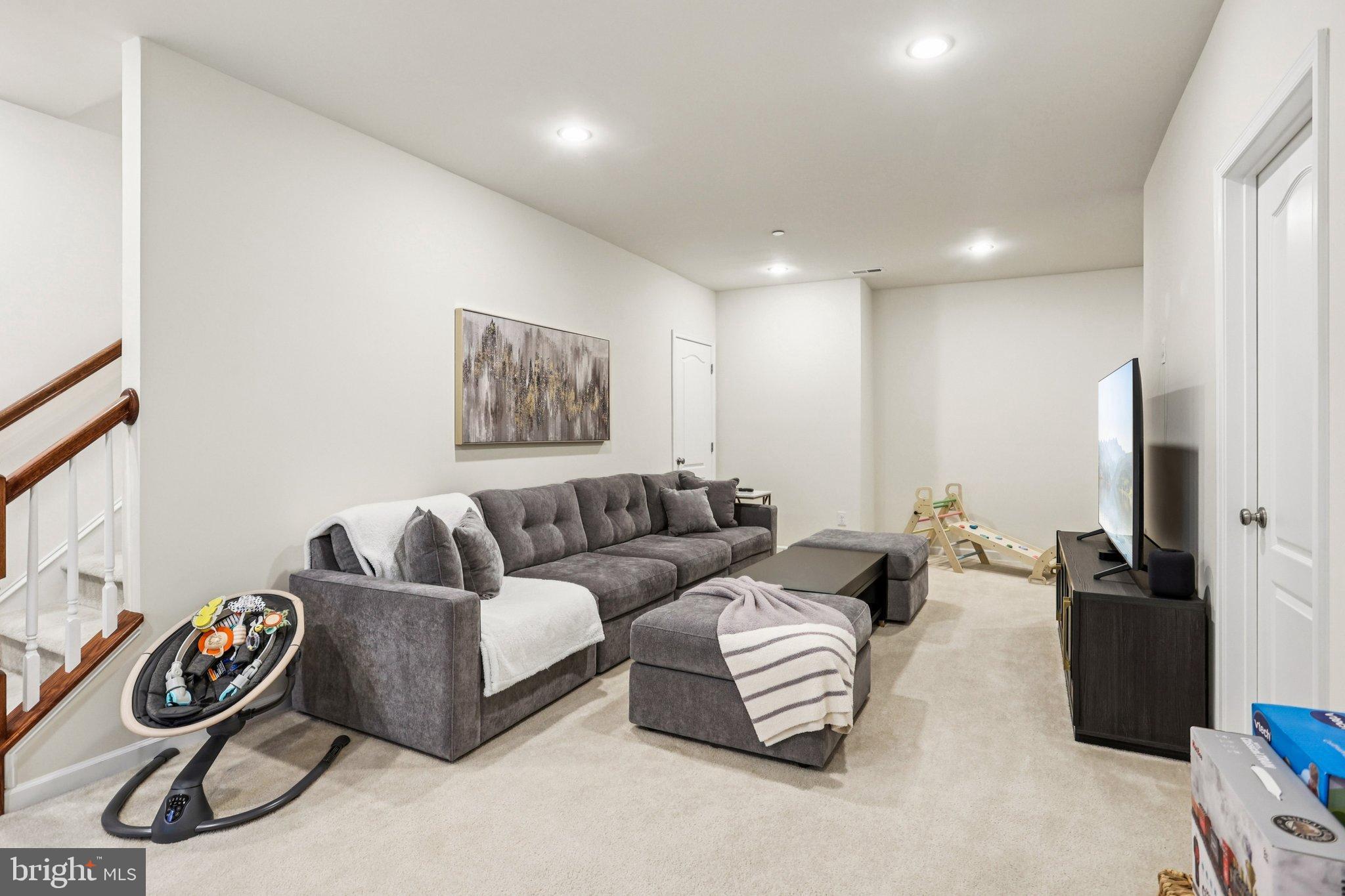 106 A Jay Alley Springfield, PA 19064 - Photo 32 of 44 Spacious, modern living area with cozy vibes.