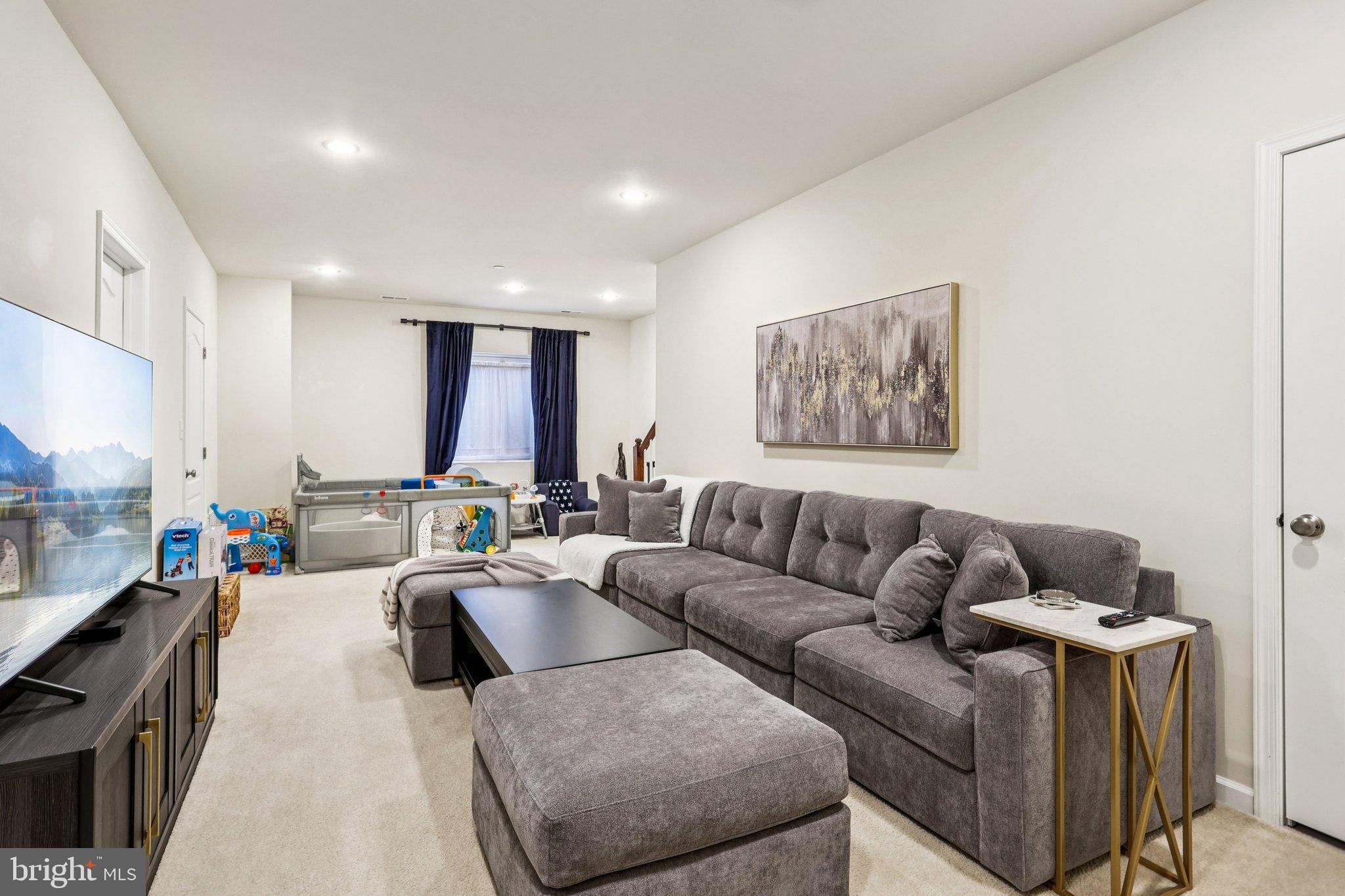 106 A Jay Alley Springfield, PA 19064 - Photo 34 of 44 a living room with furniture and a couch