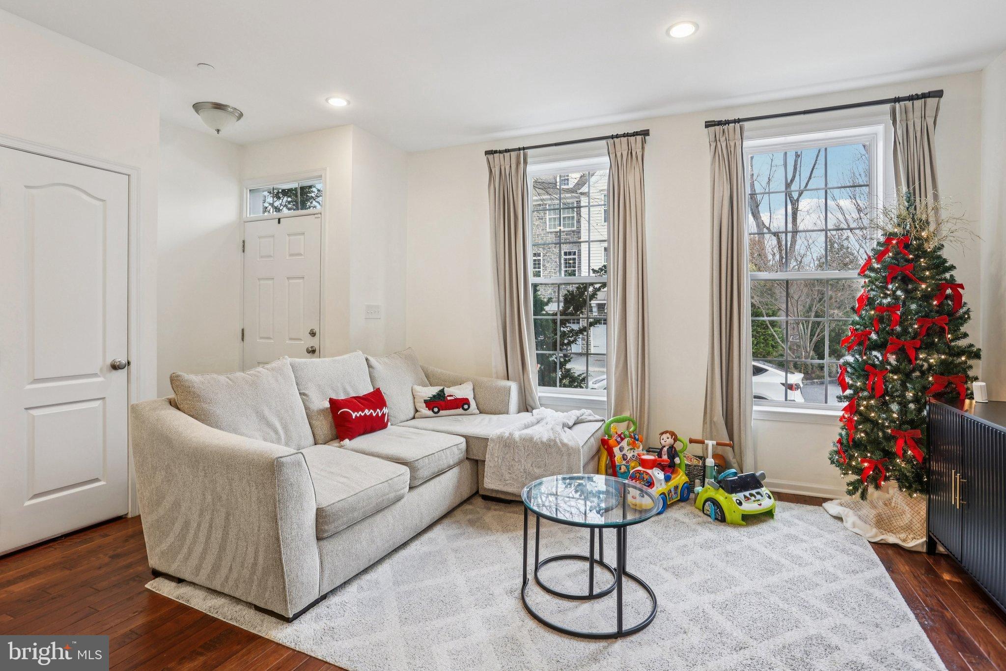 106 A Jay Alley Springfield, PA 19064 - Photo 5 of 44 a living room with furniture and a potted plant