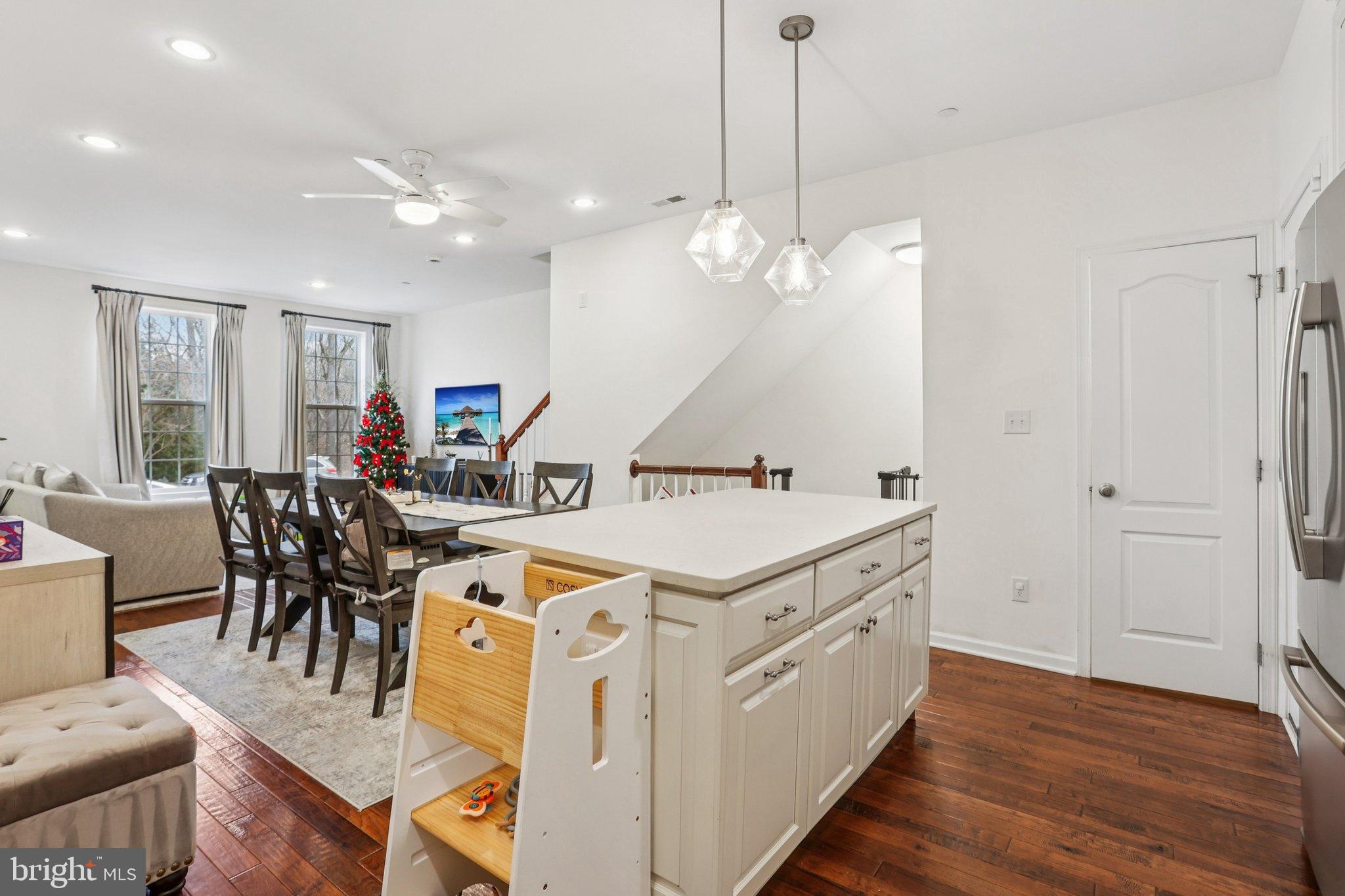 106 A Jay Alley Springfield, PA 19064 - Photo 8 of 44 a view of a dining room and livingroom with furniture wooden floor a chandelier