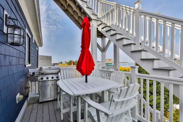 a view of dinning table and chairs in patio