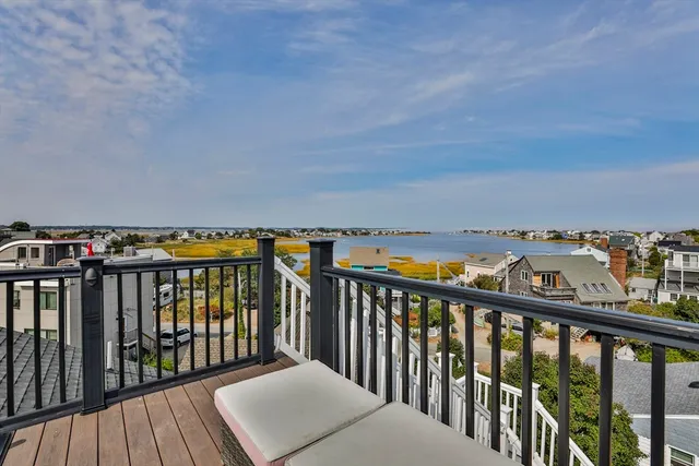 a balcony with a city view