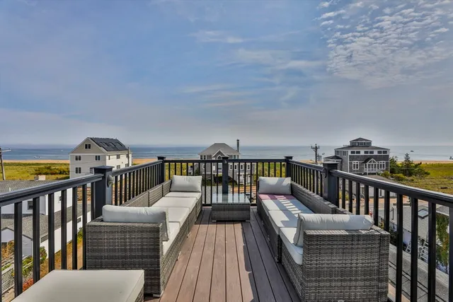 a view of balcony with furniture
