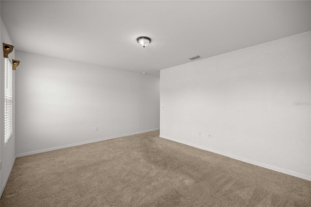3902 Southeast 99th Street Belleview, FL 34420 - Photo 15 of 28 a view of an empty room