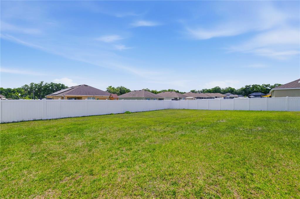 3902 Southeast 99th Street Belleview, FL 34420 - Photo 4 of 28 a view of an outdoor space and yard
