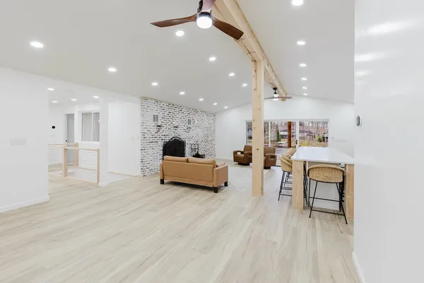 a kitchen with stainless steel appliances a stove sink and refrigerator
