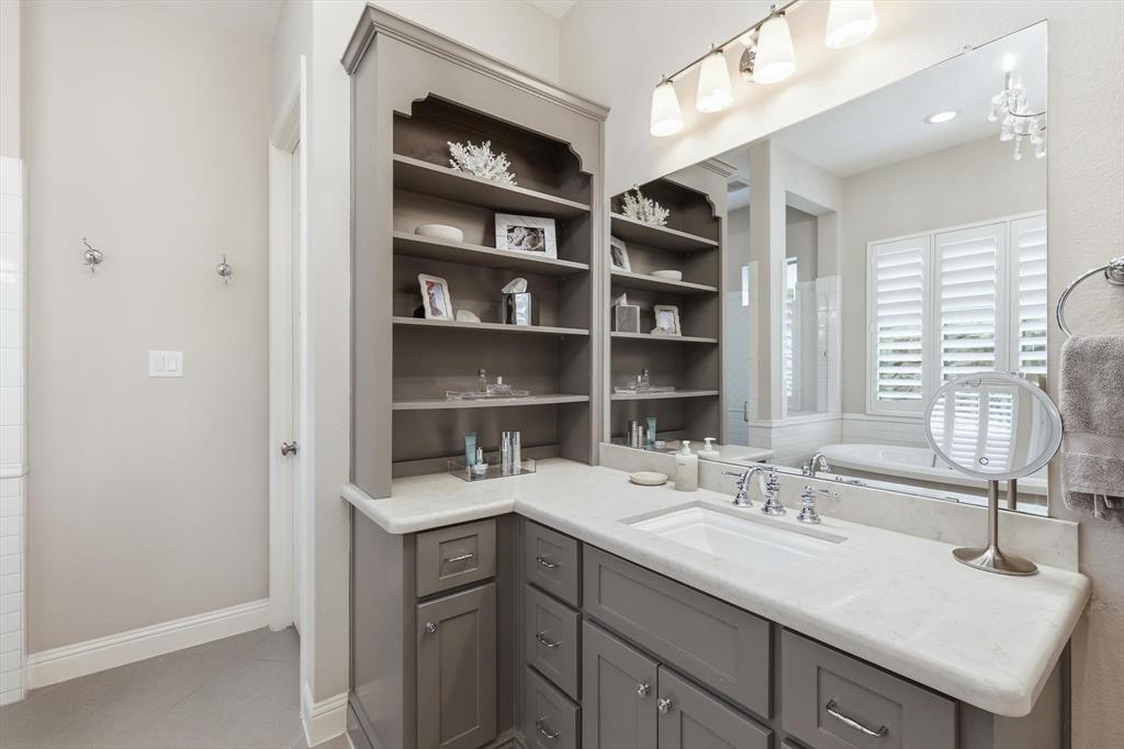 6721 Oak Knoll Road Flower Mound, TX 76226 - Photo 12 of 40 Extra shelving space in primary bathroom.