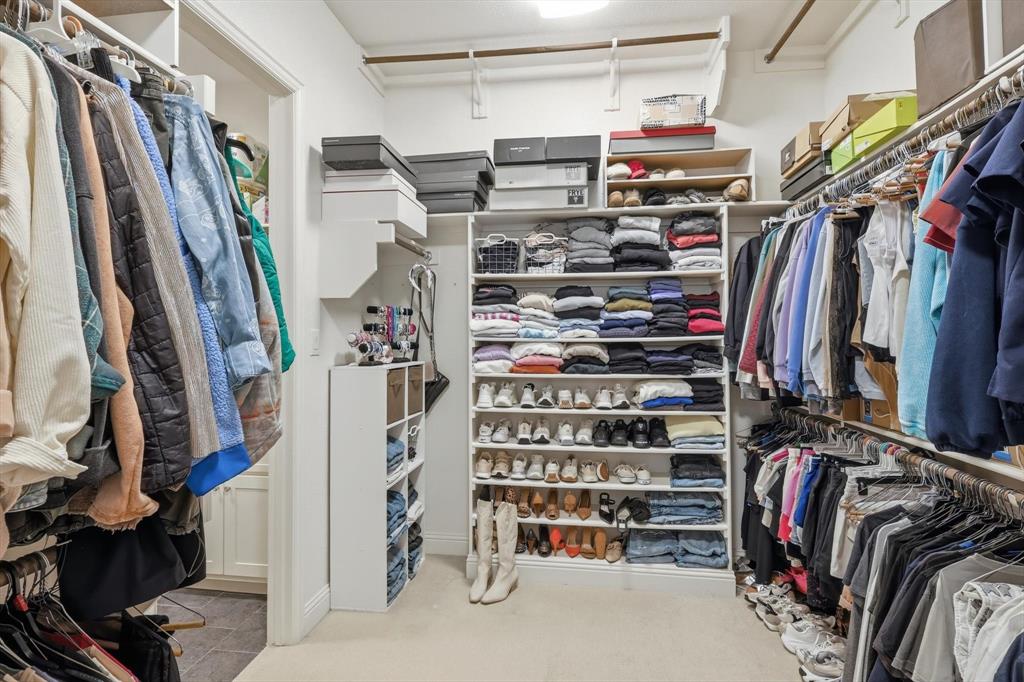 6721 Oak Knoll Road Flower Mound, TX 76226 - Photo 13 of 40 A massive closet that has direct access to the laundry! Super convenient.