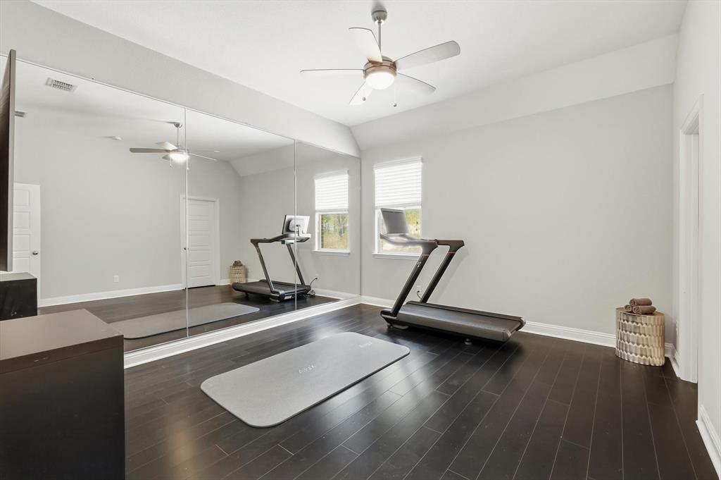 6721 Oak Knoll Road Flower Mound, TX 76226 - Photo 26 of 40 Bedroom #5 being used as a hot yoga/ fitness room