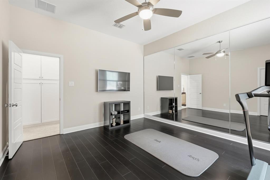 6721 Oak Knoll Road Flower Mound, TX 76226 - Photo 27 of 40 Bedroom #5 being used as a hot yoga/ fitness room