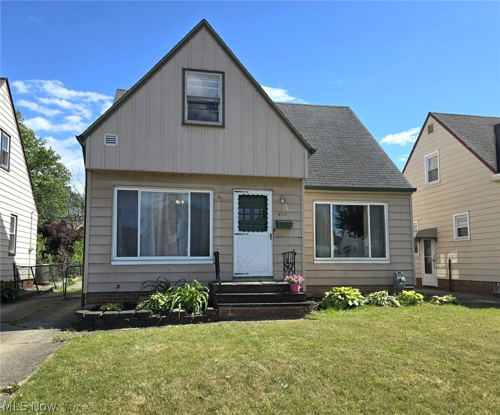 View of front of home with a front lawn