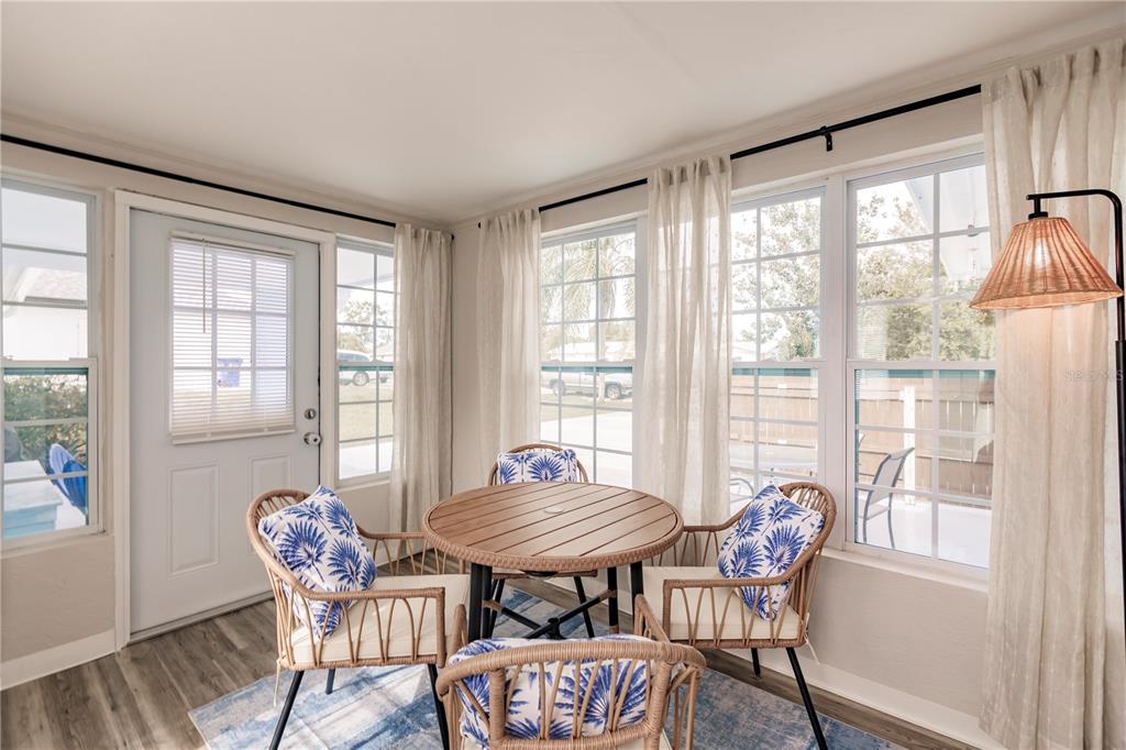 688 Constance Road Venice, FL 34293 - Photo 5 of 11 a view of a room with lounge chair wooden floor