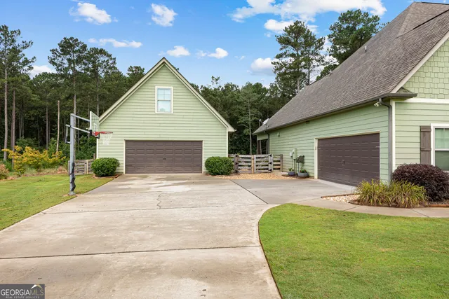 a bedroom with a bed and a table