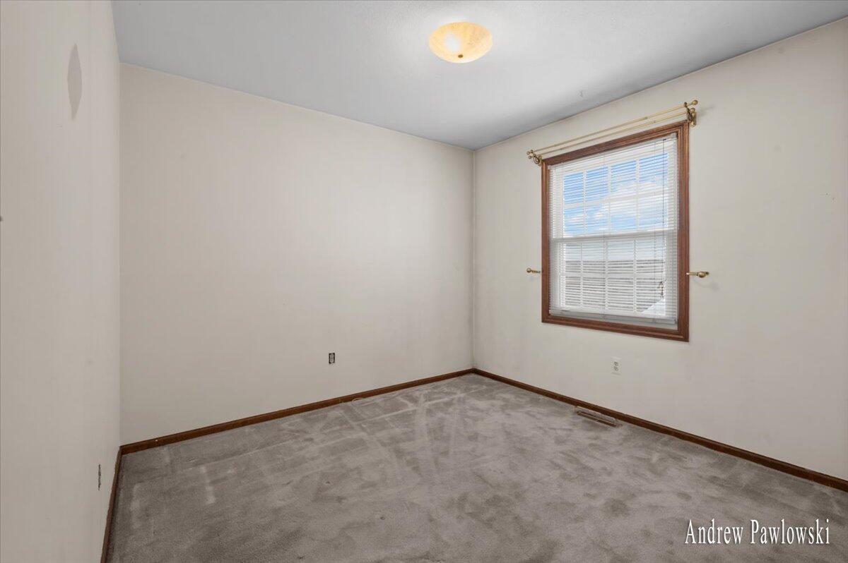 7763 Coachman Lane Jenison, MI 49428 - Photo 13 of 25 2nd Bedroom