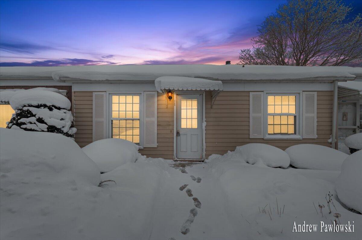 7763 Coachman Lane Jenison, MI 49428 - Photo 21 of 25 Condo Entrance Night
