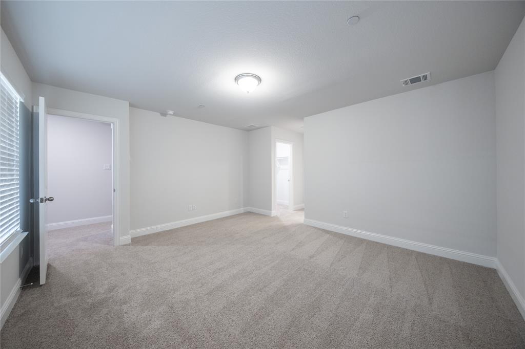 7913 Sunset Boulevard Rowlett, TX 75088 - Photo 17 of 25 a view of an empty room