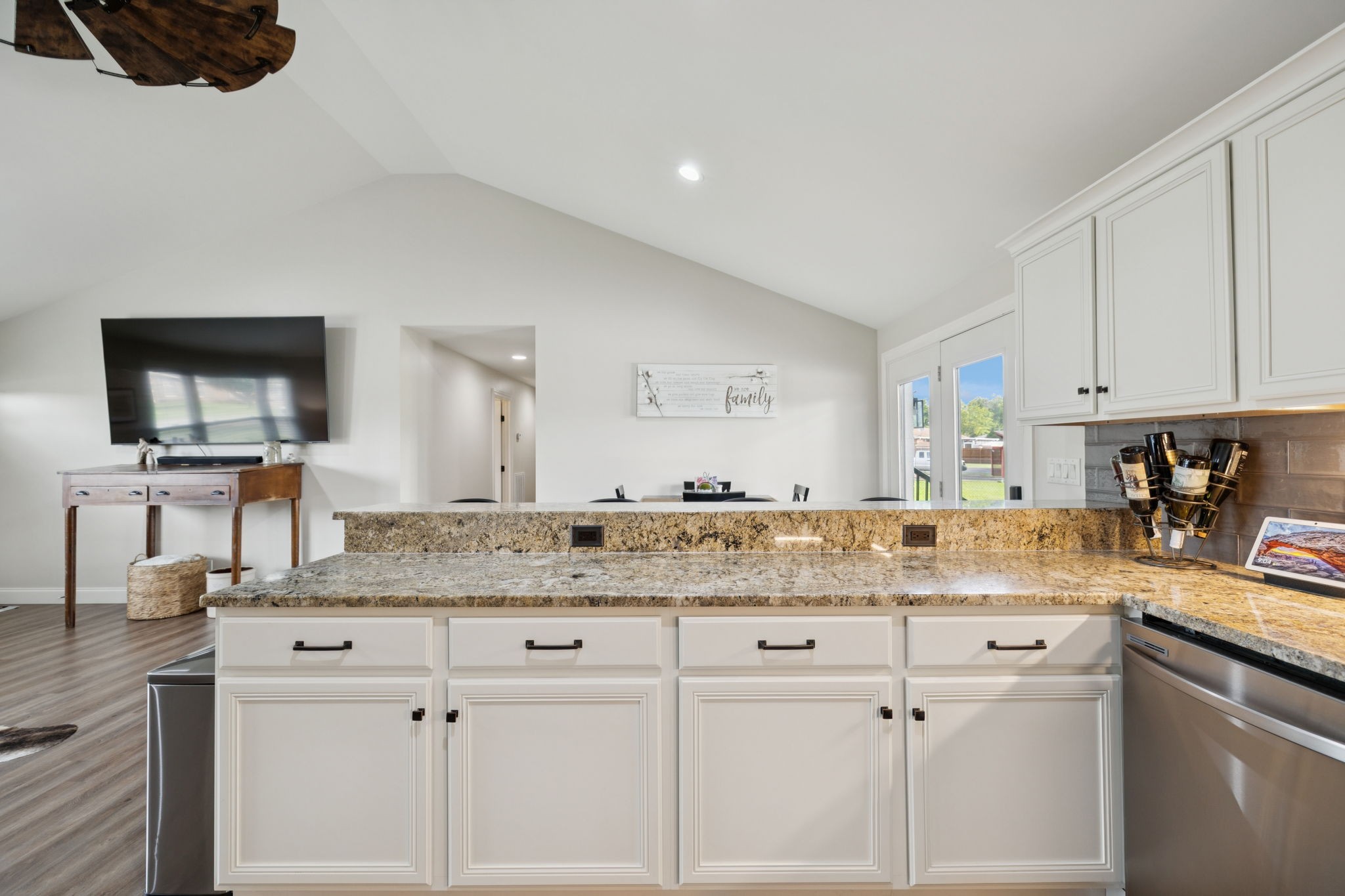 213 Knob Road Lebanon, TN 37087 - Photo 13 of 39 a kitchen with granite countertop a sink and white cabinets