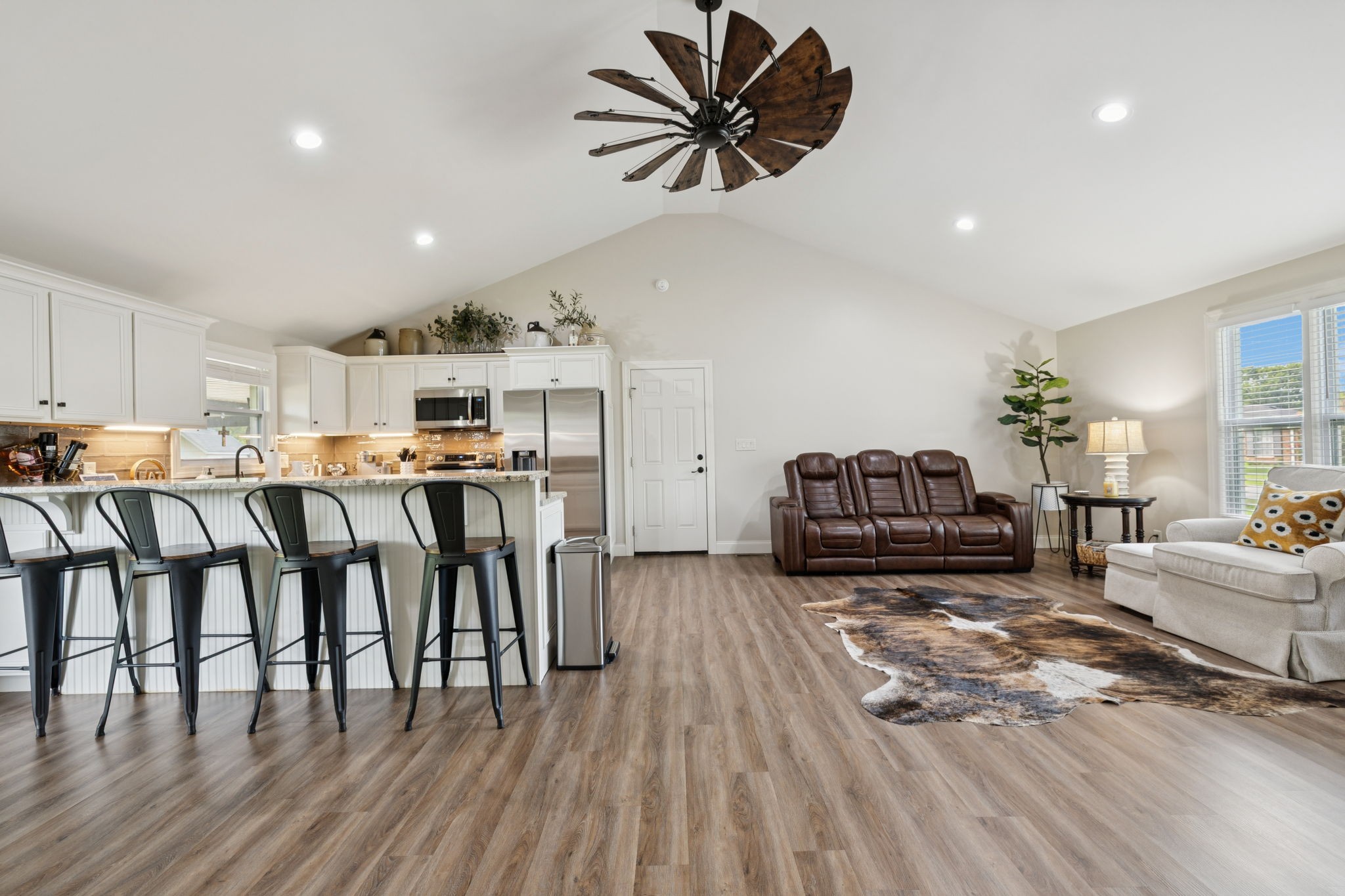 213 Knob Road Lebanon, TN 37087 - Photo 16 of 39 a living room with lots of furniture and kitchen view
