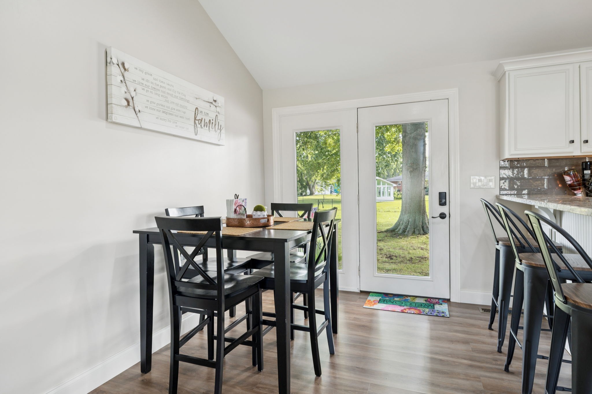 213 Knob Road Lebanon, TN 37087 - Photo 17 of 39 a view of a dining room with furniture and wooden floor