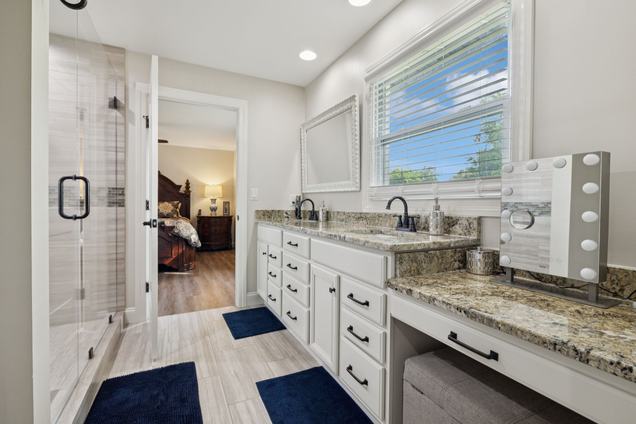 213 Knob Road Lebanon, TN 37087 - Photo 21 of 39 a bathroom with a granite countertop sink mirror and shower