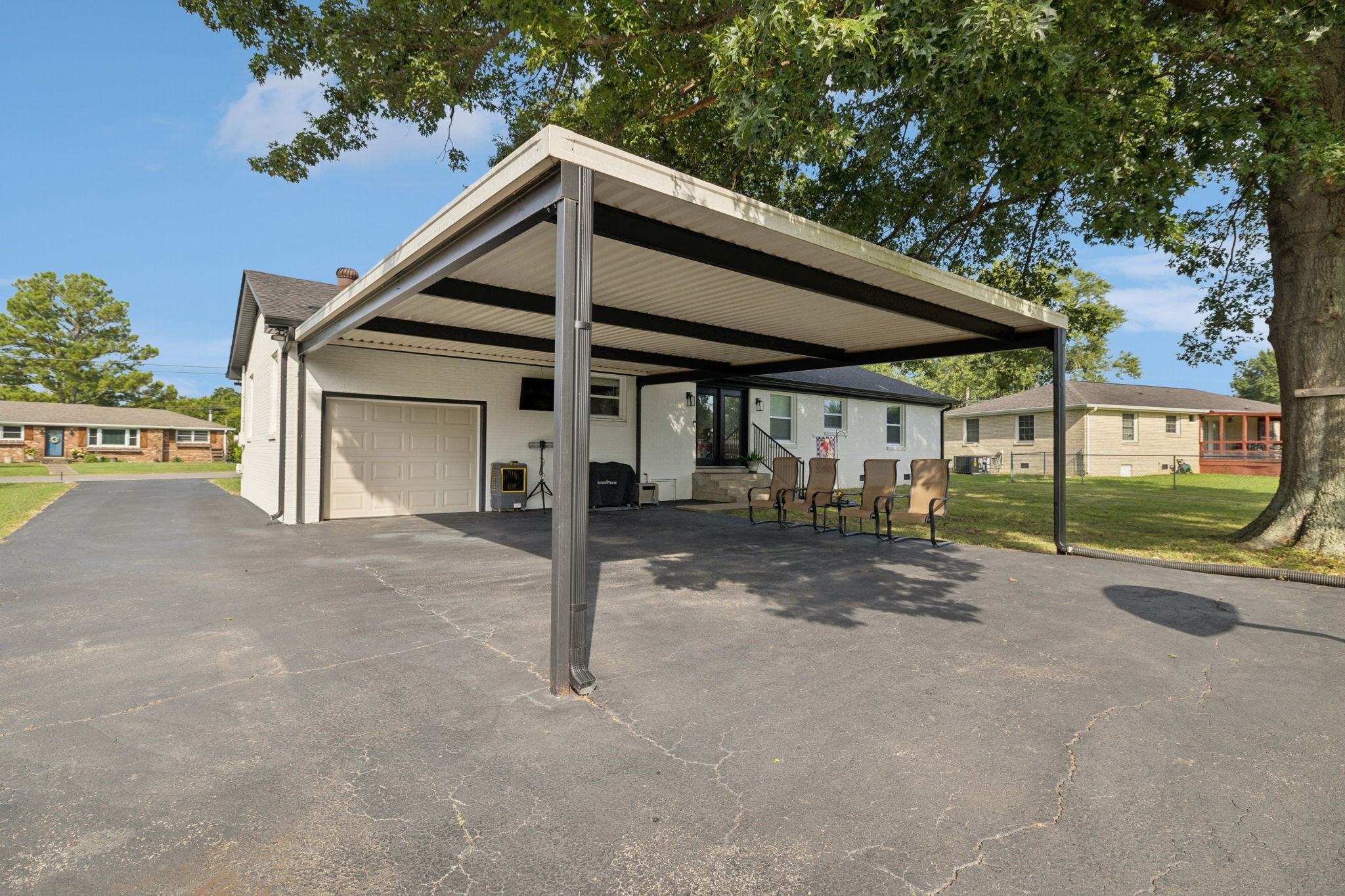 213 Knob Road Lebanon, TN 37087 - Photo 37 of 39 a view of a house with porch and garage