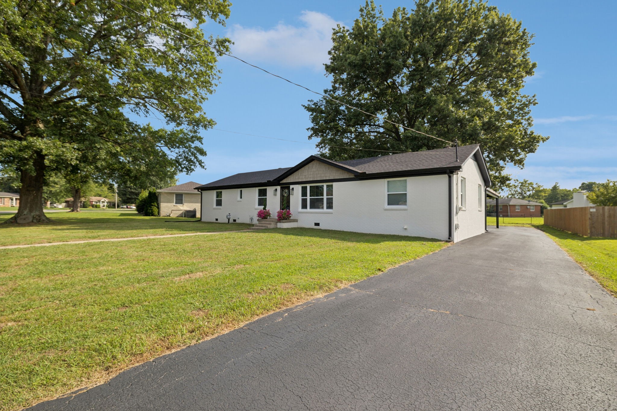 213 Knob Road Lebanon, TN 37087 - Photo 4 of 39 a front view of a house with a garden