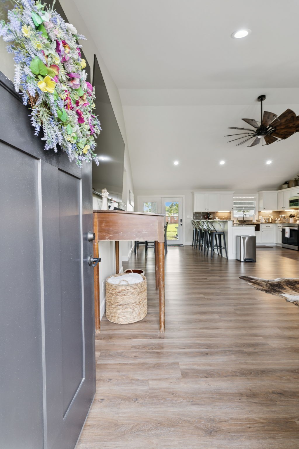 213 Knob Road Lebanon, TN 37087 - Photo 6 of 39 a dining room with furniture a kitchen a refrigerator and a potted plant