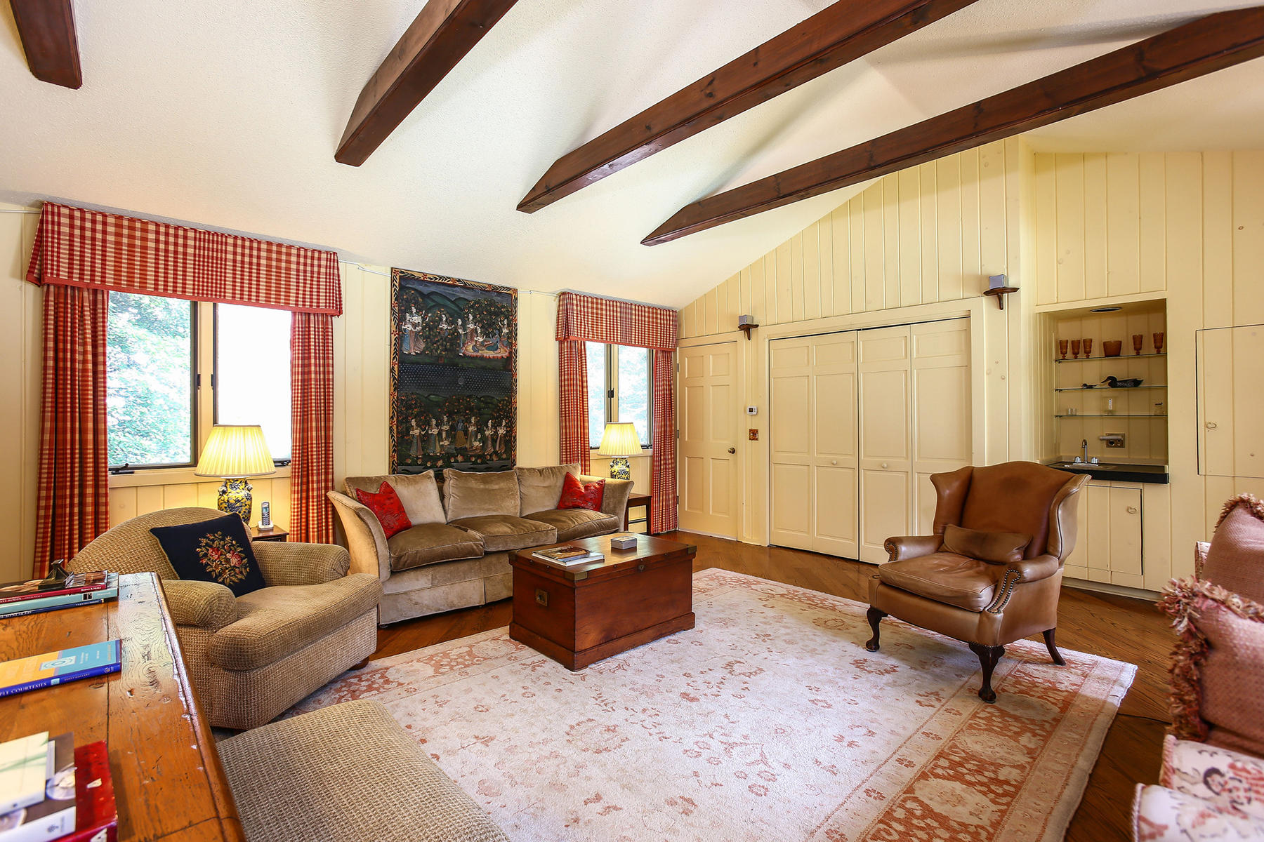 30 Old Oak Road Darien, CT 06820 - Photo 15 of 25 a living room with furniture and a large window
