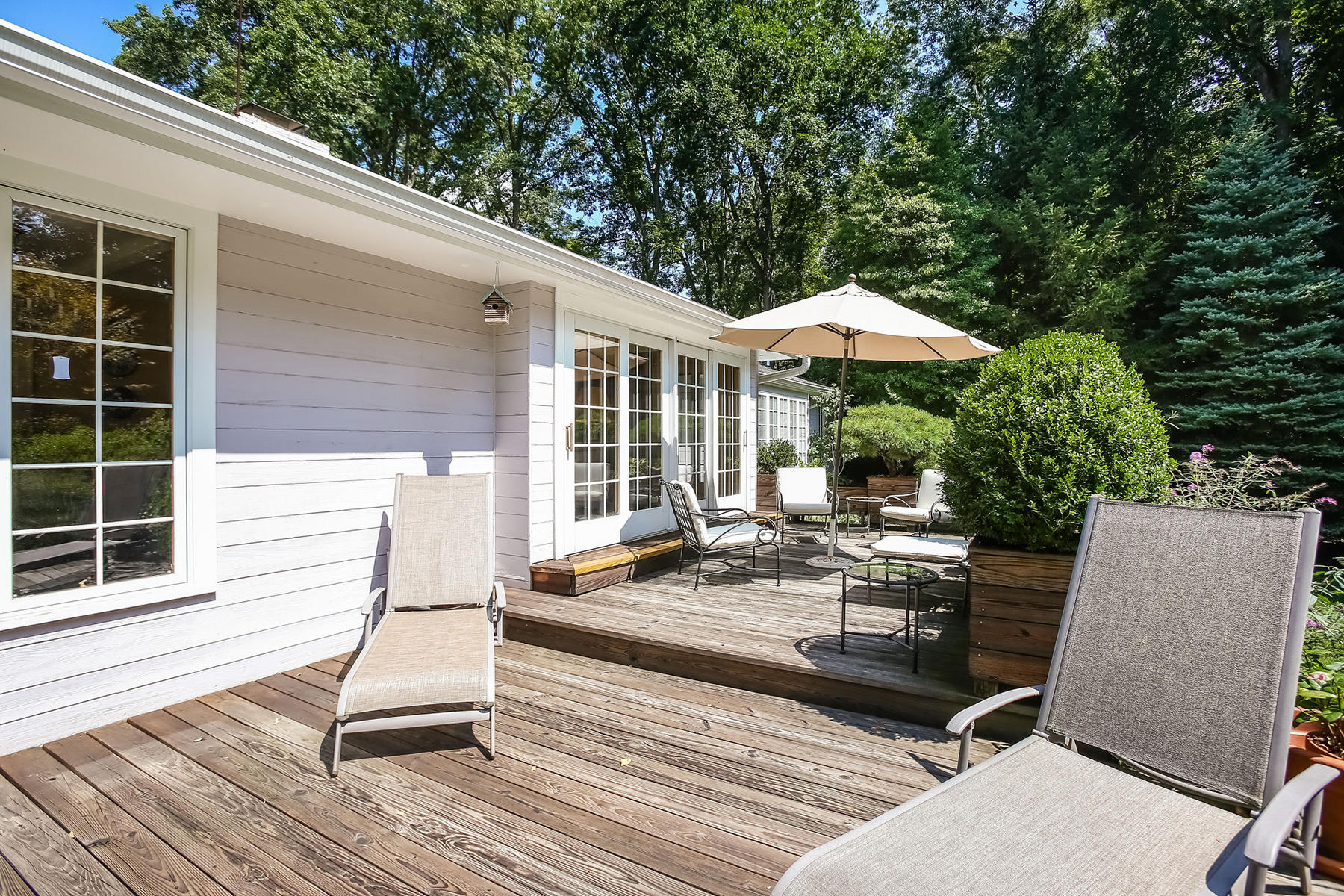 30 Old Oak Road Darien, CT 06820 - Photo 18 of 25 a view of a house with backyard and sitting area