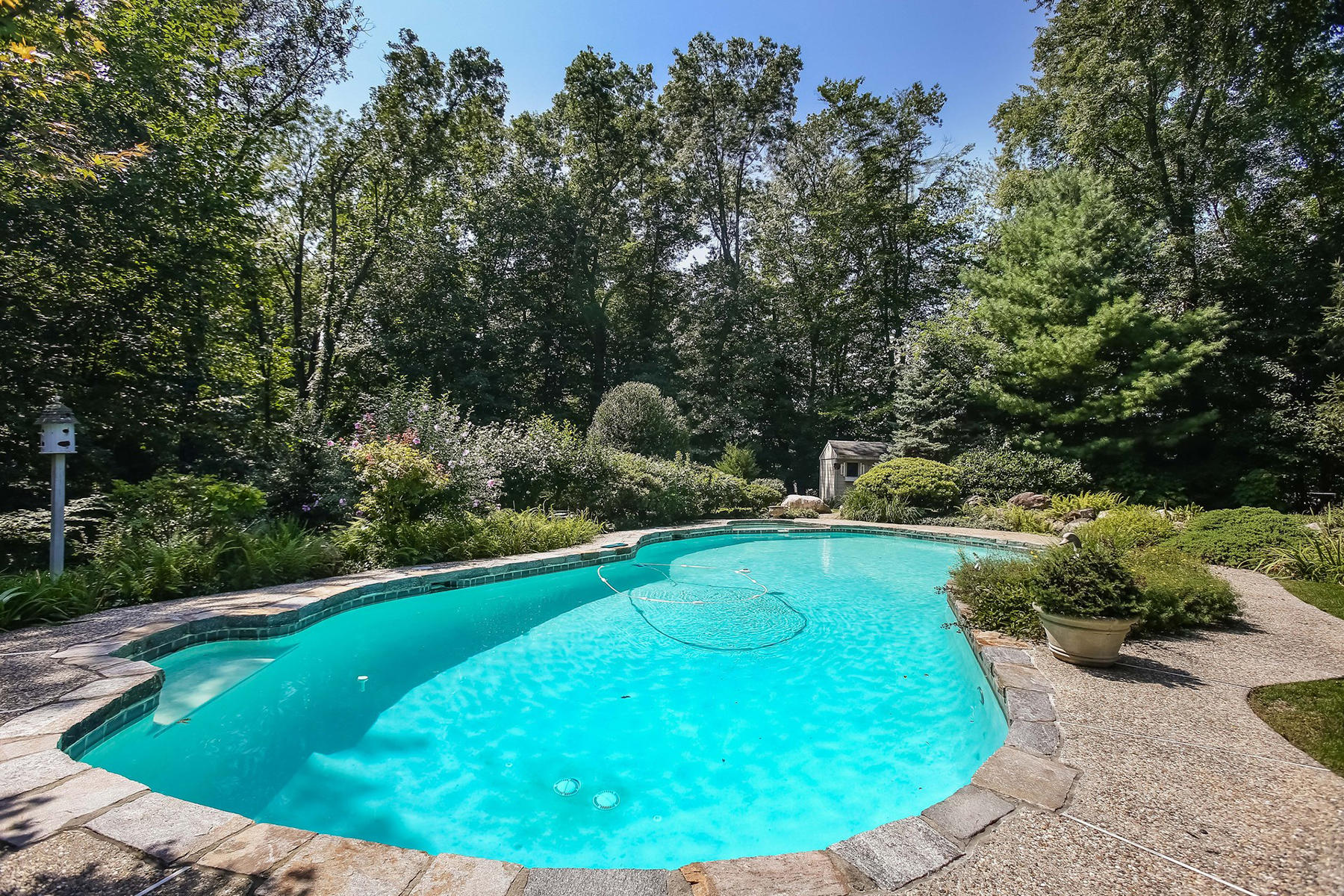 30 Old Oak Road Darien, CT 06820 - Photo 3 of 25 a view of a swimming pool with a patio