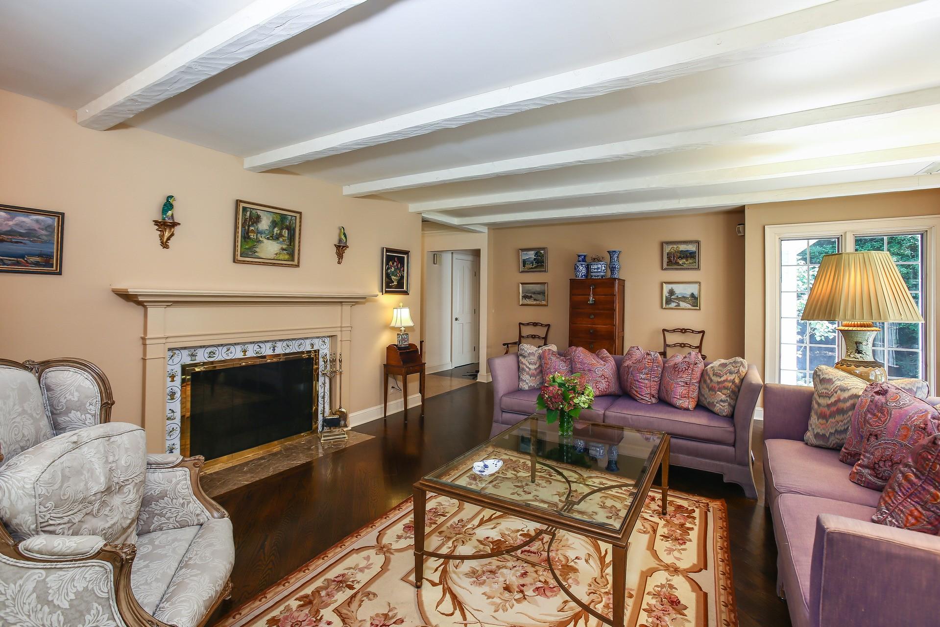 30 Old Oak Road Darien, CT 06820 - Photo 5 of 25 a living room with furniture and a fireplace