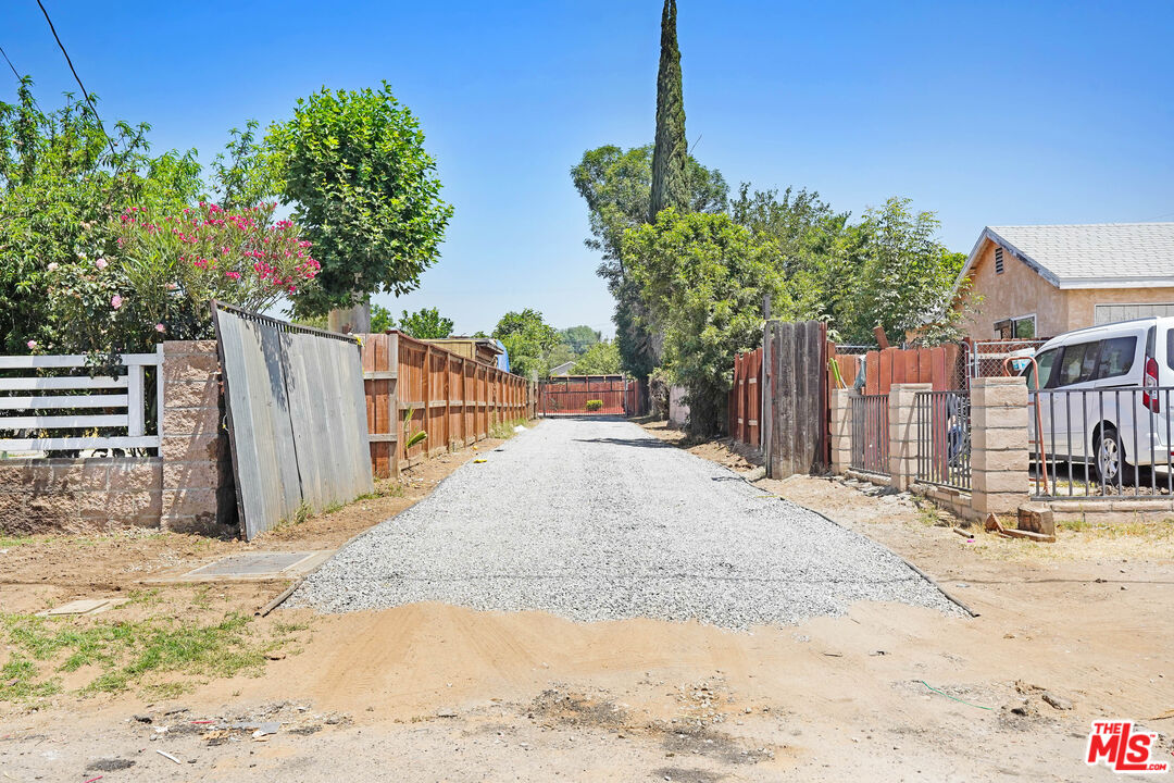 1047 West H Street Colton, CA 92324 - Photo 3 of 13 a view of a backyard of the house