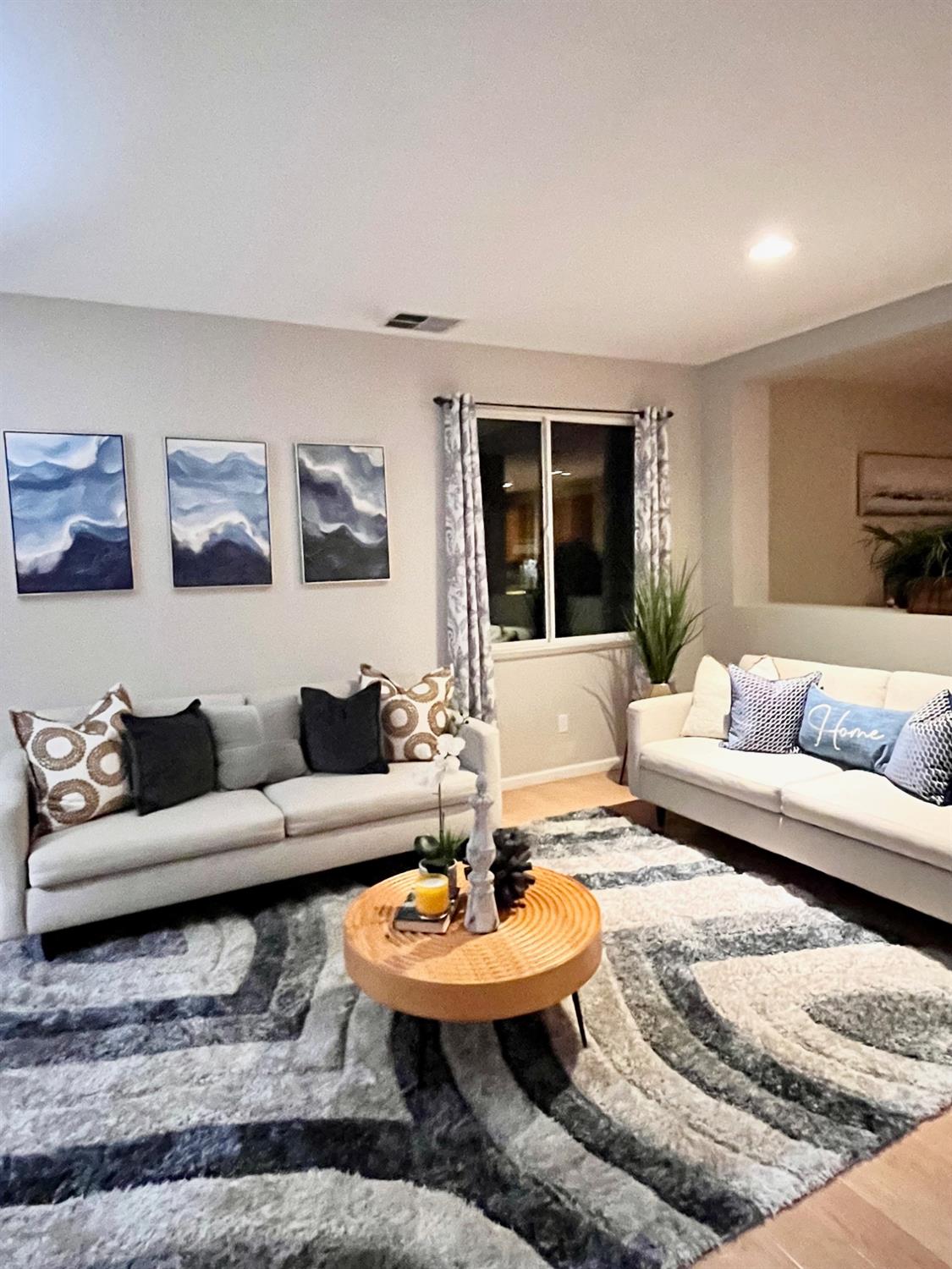 1450 Longhorn Lane Patterson, CA 95363 - Photo 18 of 32 a living room with furniture and a large window