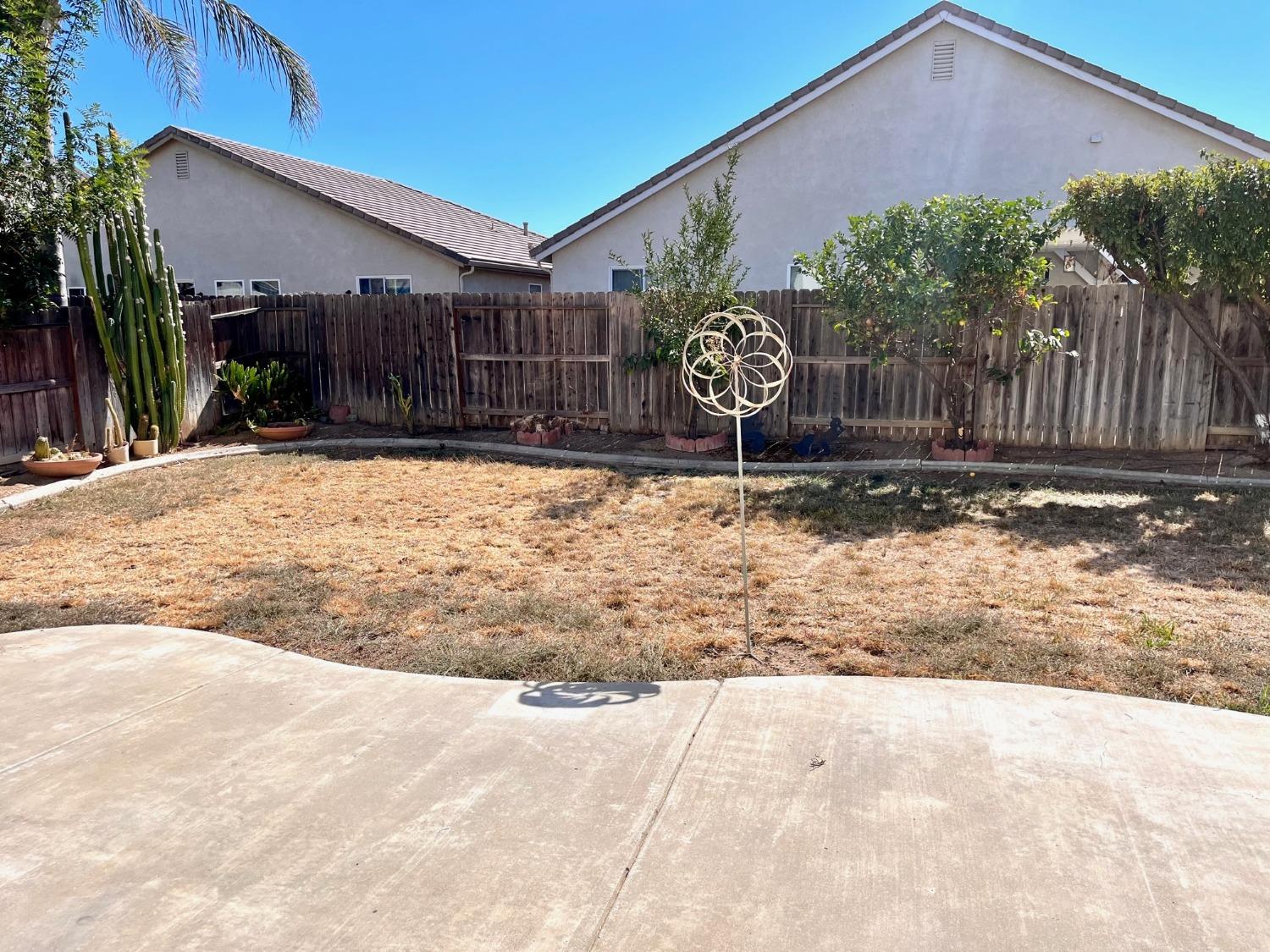 1450 Longhorn Lane Patterson, CA 95363 - Photo 10 of 32 a view of a backyard