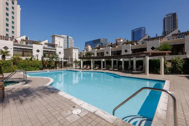 a living room with furniture or outdoor view and a large window