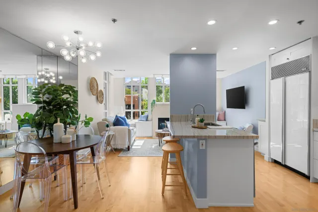 a living room with fireplace furniture and a flat screen tv
