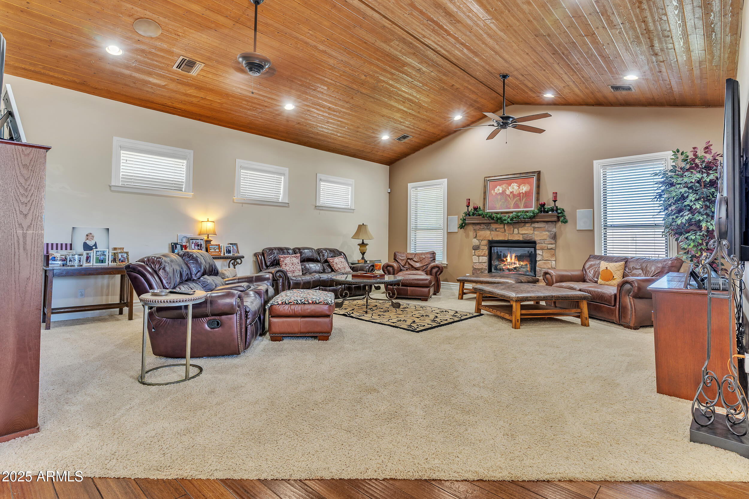 7172 Gelding Lane Coolidge, AZ 85128 - Photo 15 of 45 a living room with furniture and a fireplace