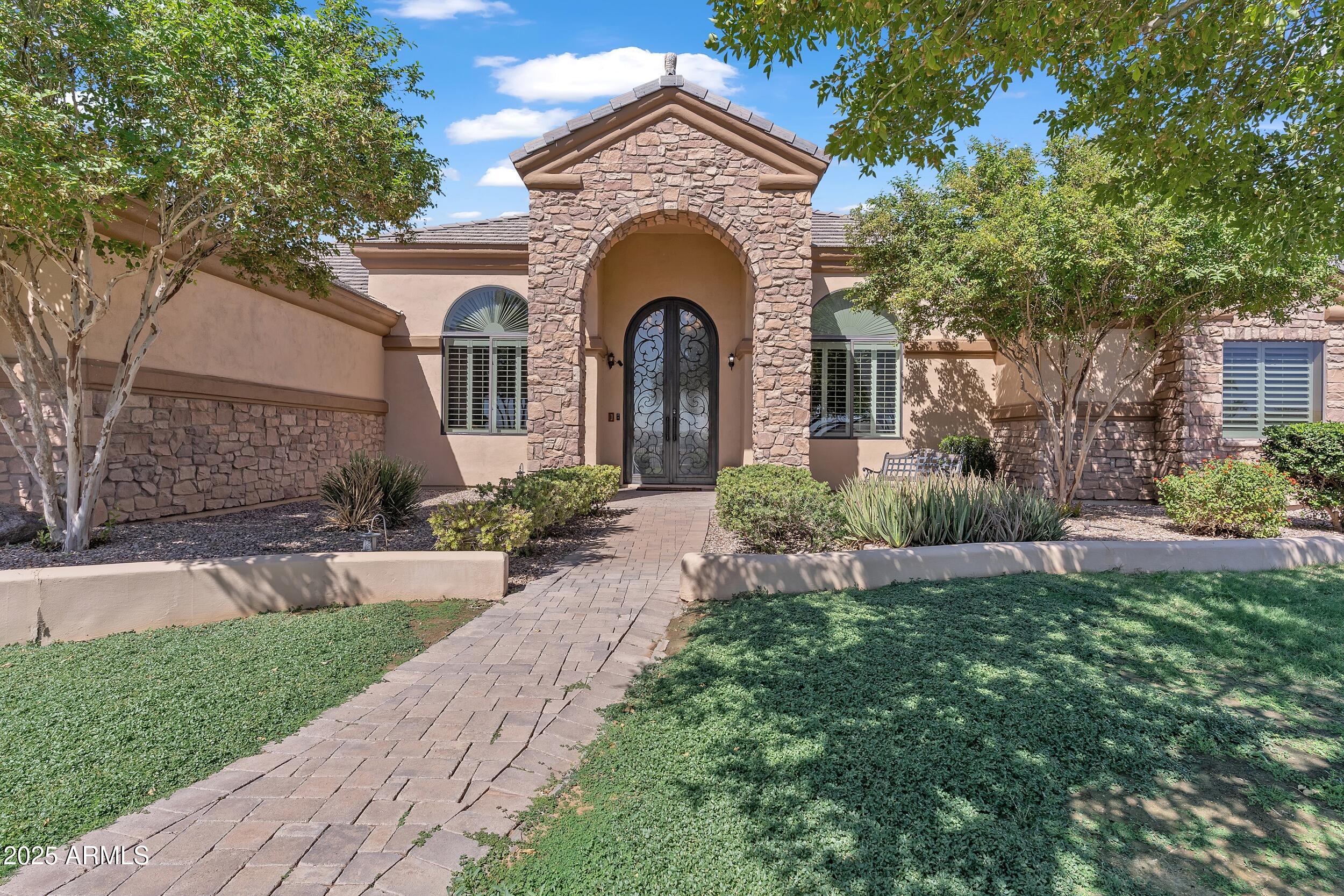 7172 Gelding Lane Coolidge, AZ 85128 - Photo 2 of 45 a front view of a house with garden