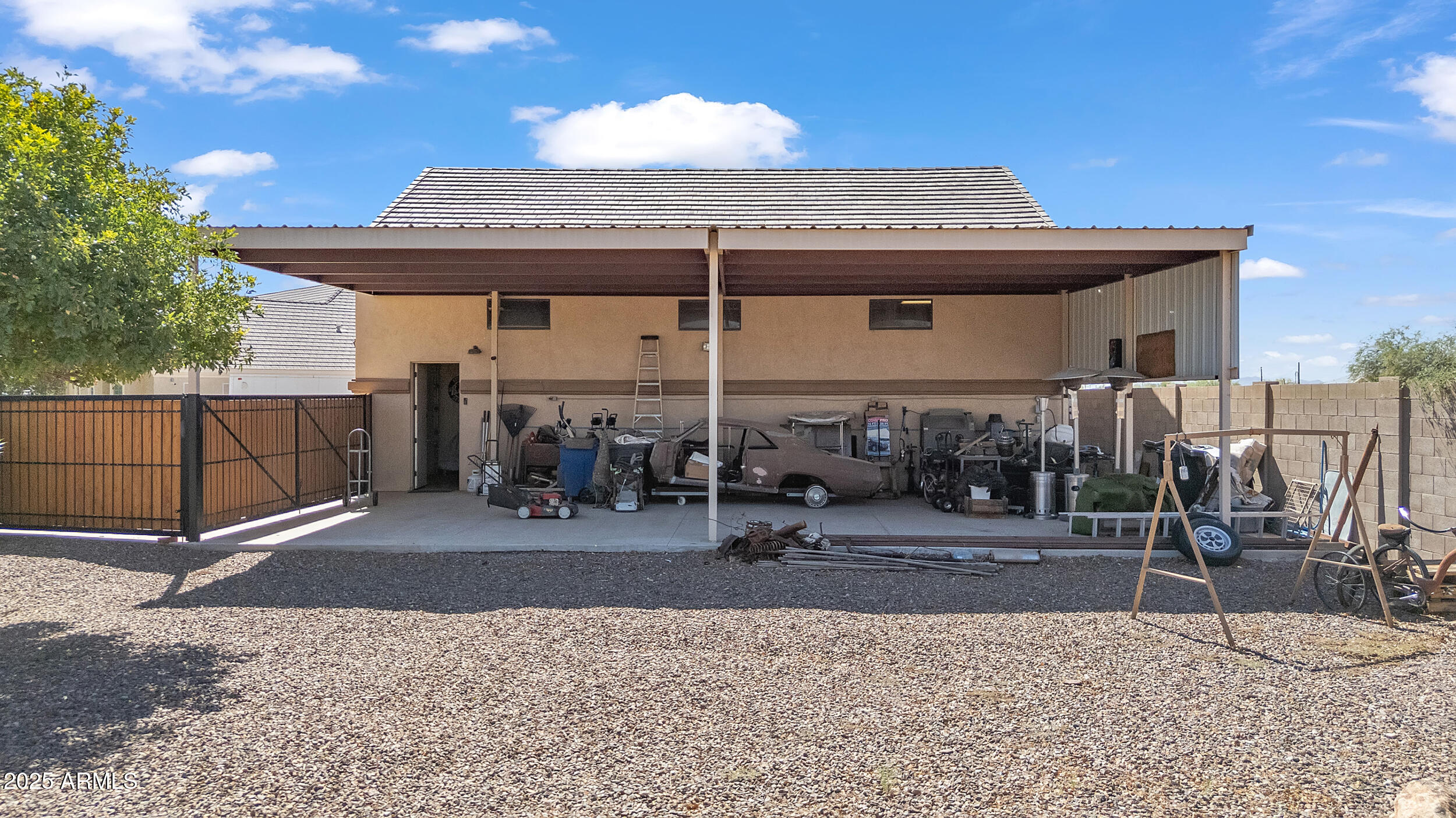 7172 Gelding Lane Coolidge, AZ 85128 - Photo 36 of 45 a view of a patio with table and chairs