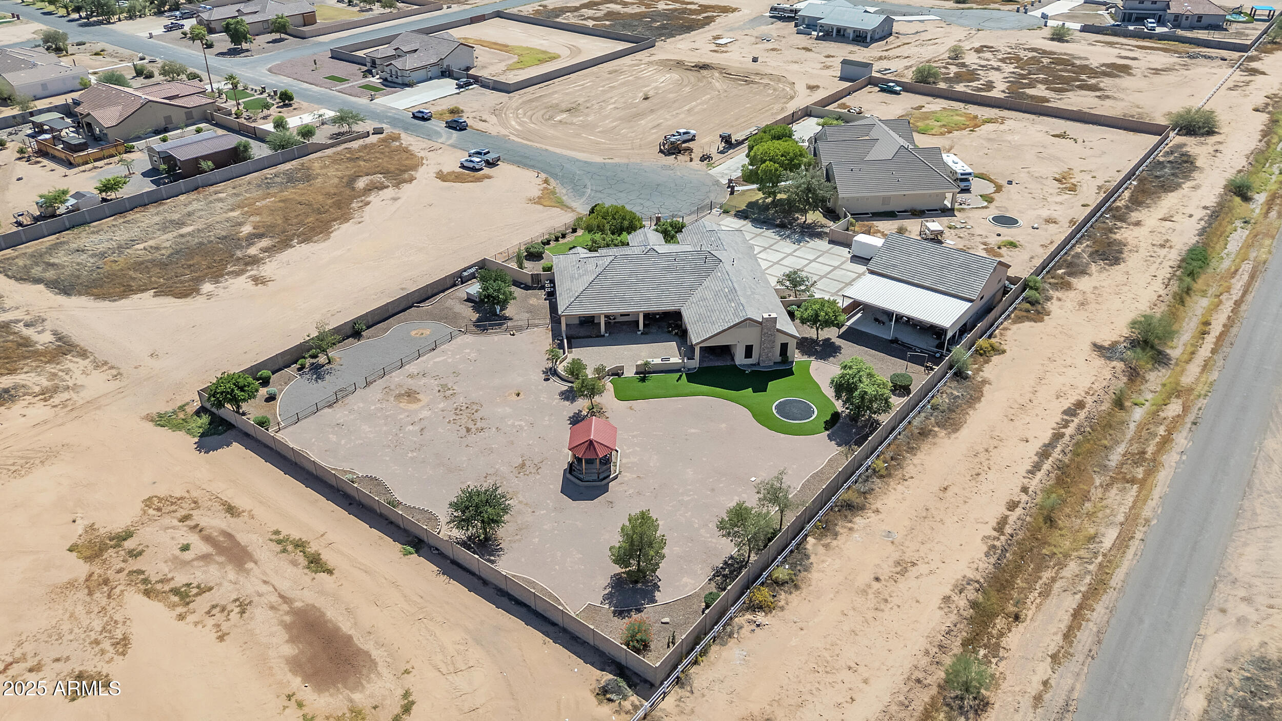 7172 Gelding Lane Coolidge, AZ 85128 - Photo 44 of 45 an aerial view of a house with a swimming pool